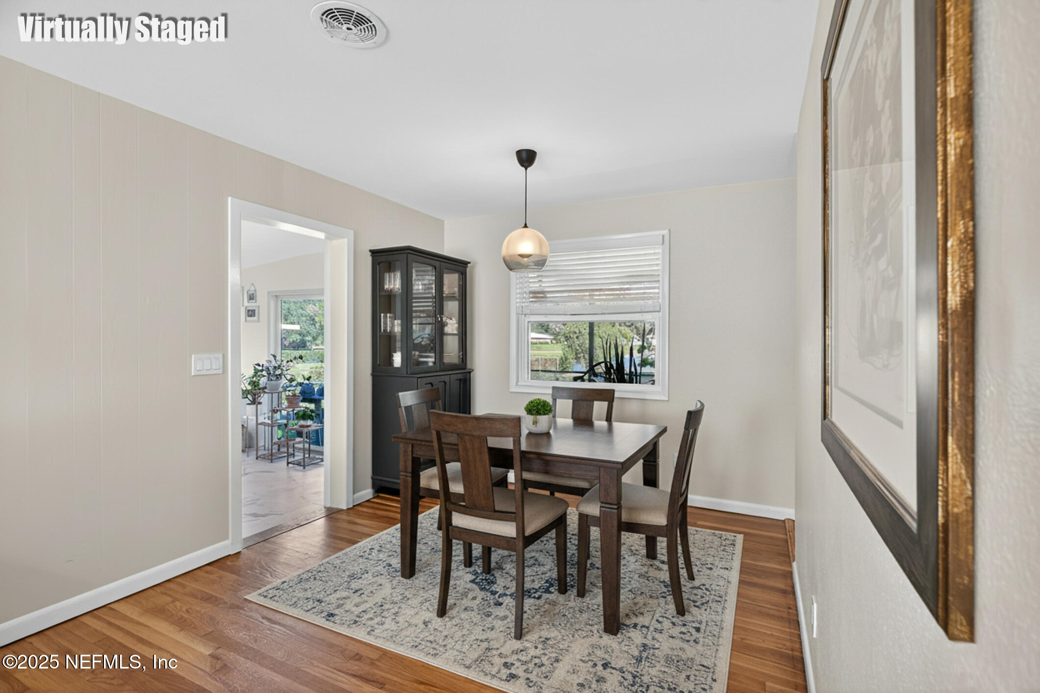 7470 Spinola Road Jacksonville, FL 32217 - Photo 18 of 76 a view of a dining room with furniture and window
