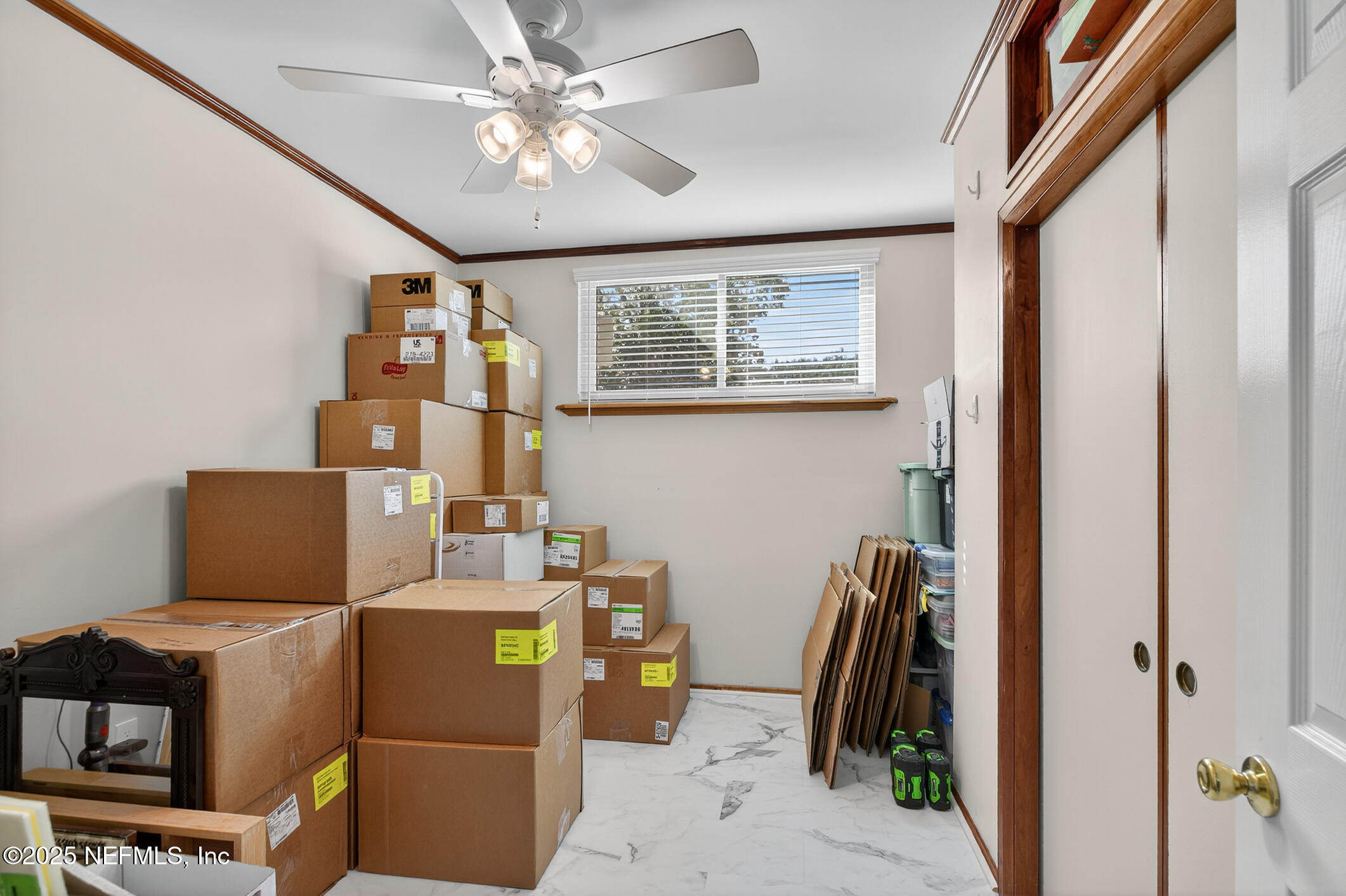7470 Spinola Road Jacksonville, FL 32217 - Photo 25 of 76 a workspace with furniture and ceiling fan