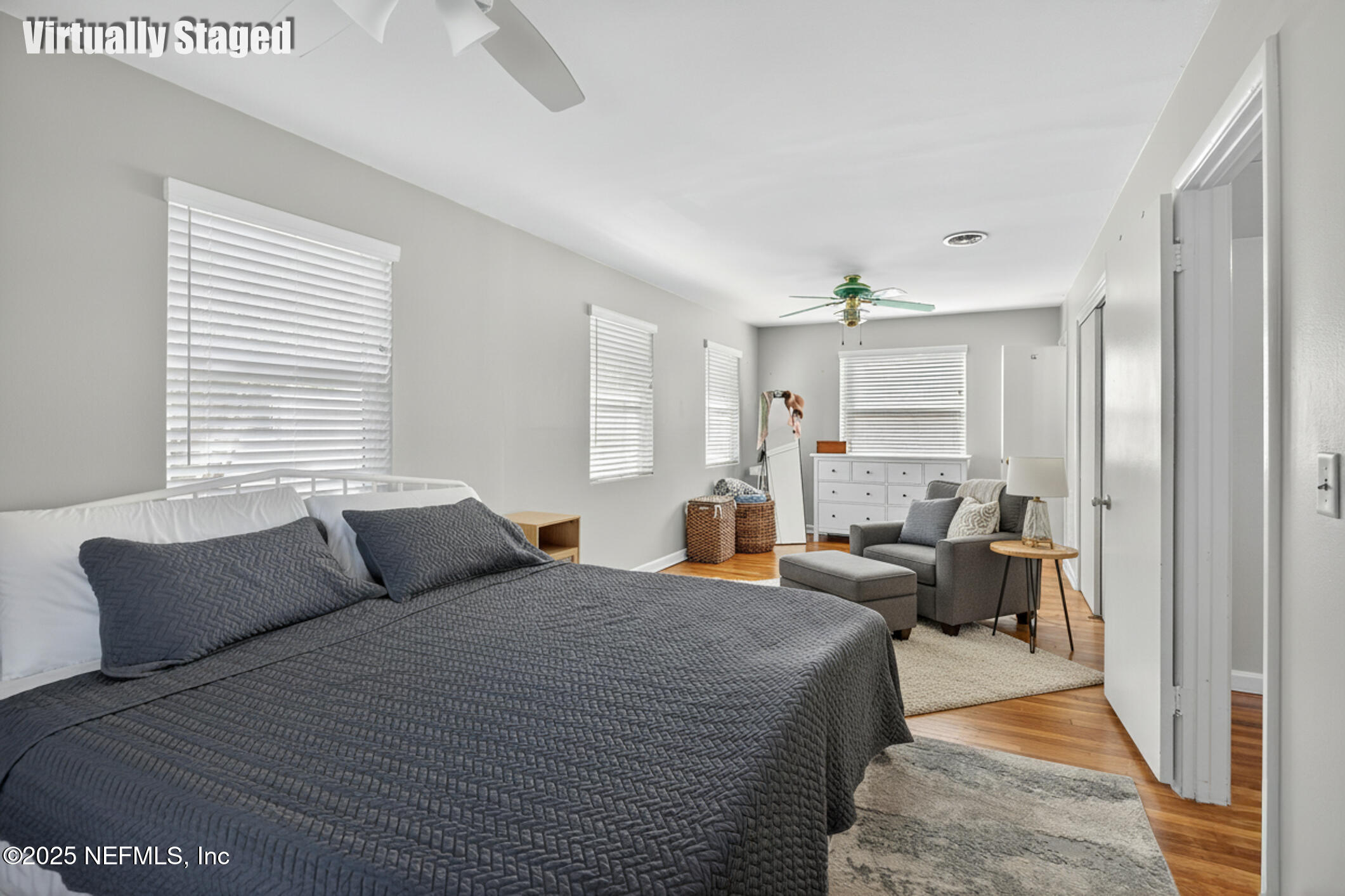 7470 Spinola Road Jacksonville, FL 32217 - Photo 46 of 76 a bedroom with a bed and a couch