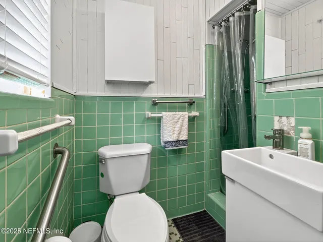 a front view of house with yard and outdoor seating