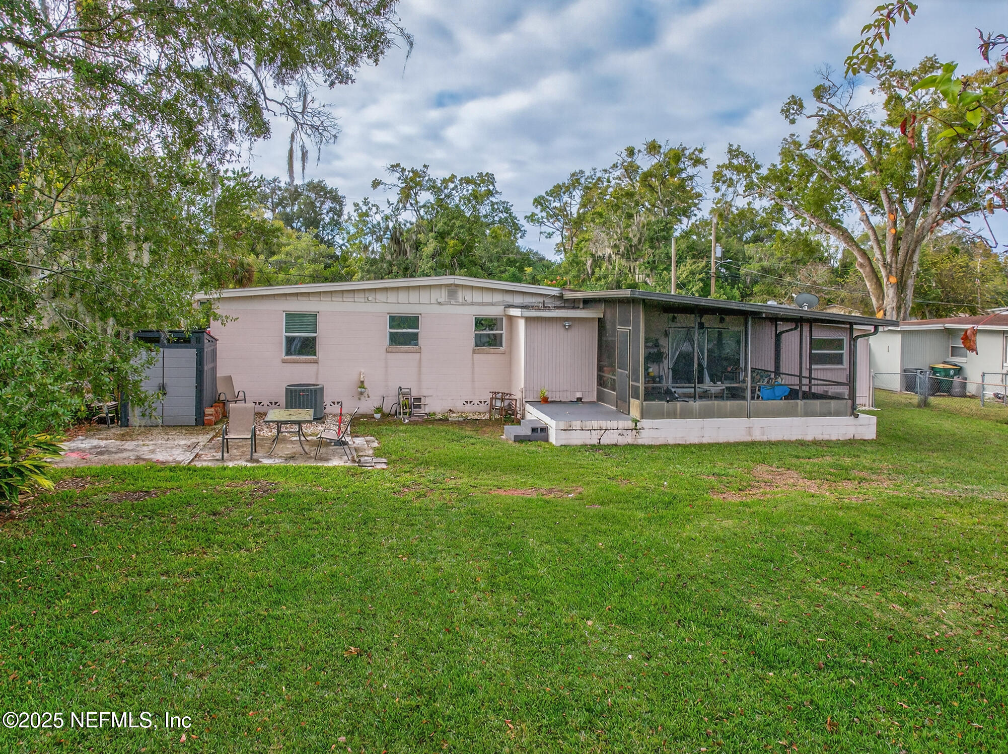 7470 Spinola Road Jacksonville, FL 32217 - Photo 71 of 76 a front view of house with yard and outdoor seating