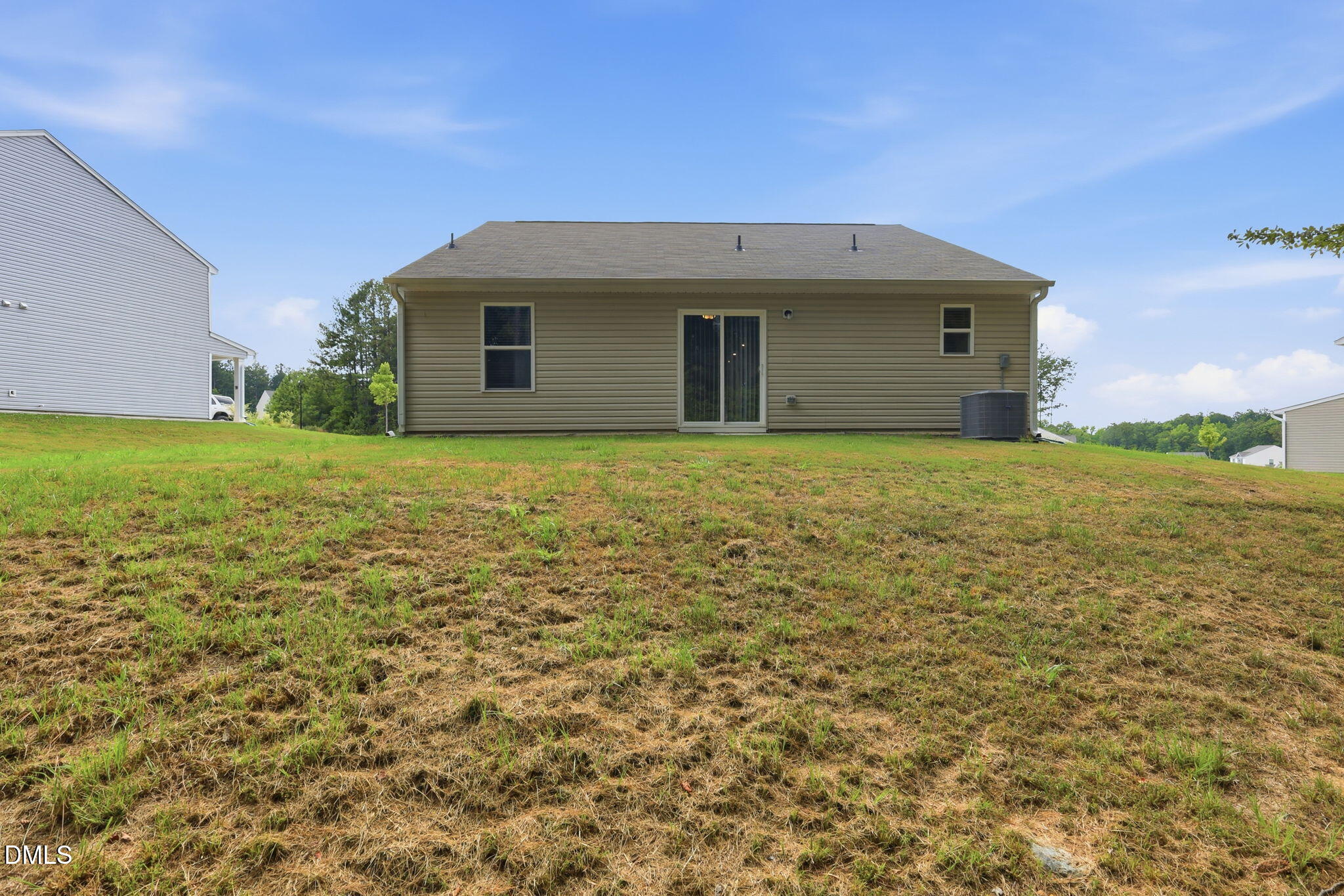 90 Everglade Way Angier, NC 27501 - Photo 34 of 36 a view of an house with backyard and garden