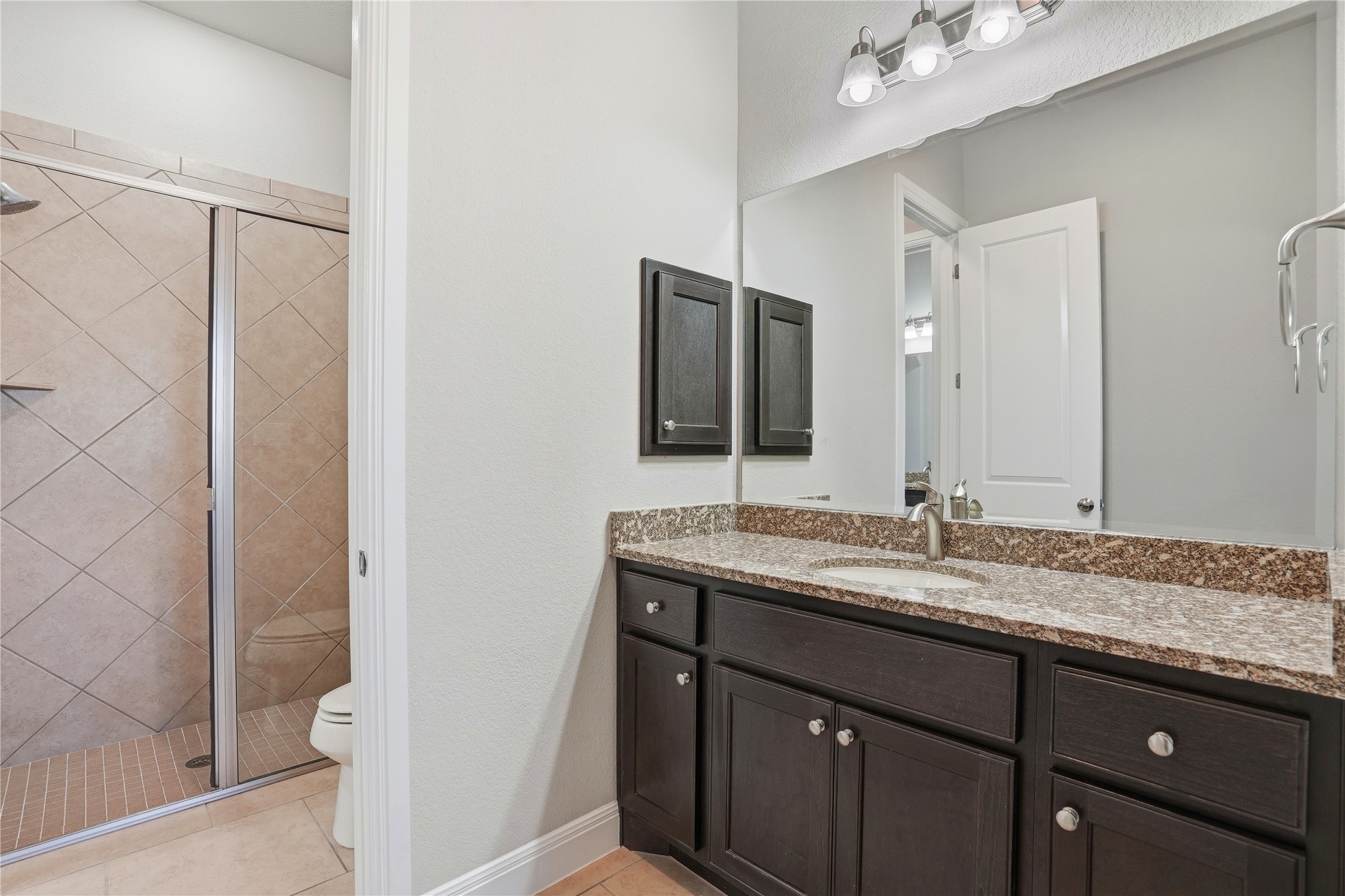 4109 Haight Street Round Rock, TX 78681 - Photo 29 of 40 Full bathroom featuring a large shower