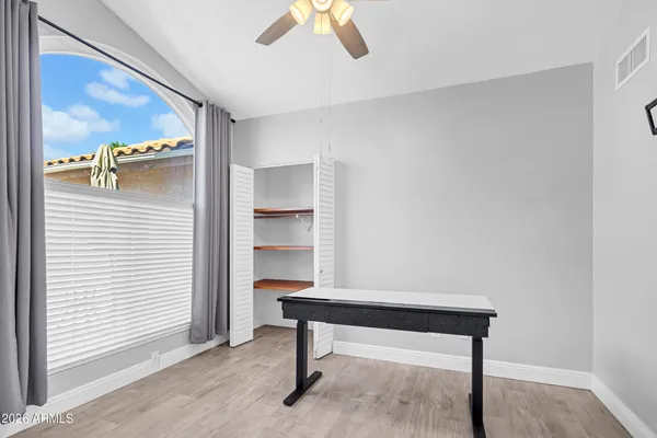 a room with furniture and a window