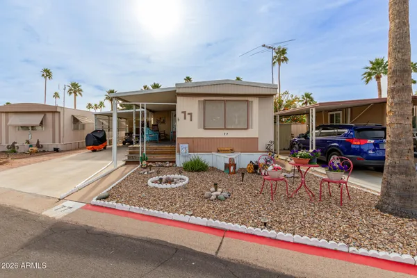 a view of a car park in front of house