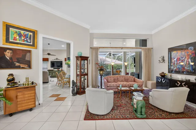 a kitchen with stainless steel appliances kitchen island granite countertop a sink and cabinets