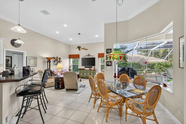 a outdoor living space with furniture and a flat screen tv