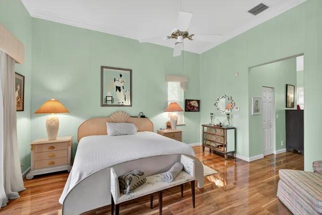a aerial view of a house with a yard table and chairs