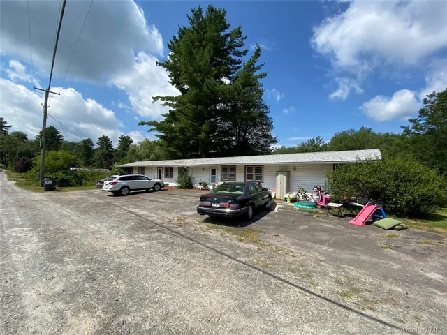 a car parked in front of a house