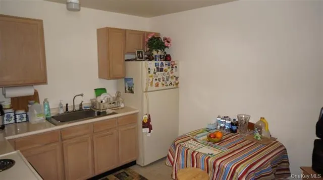 a bedroom with a bed and cabinets