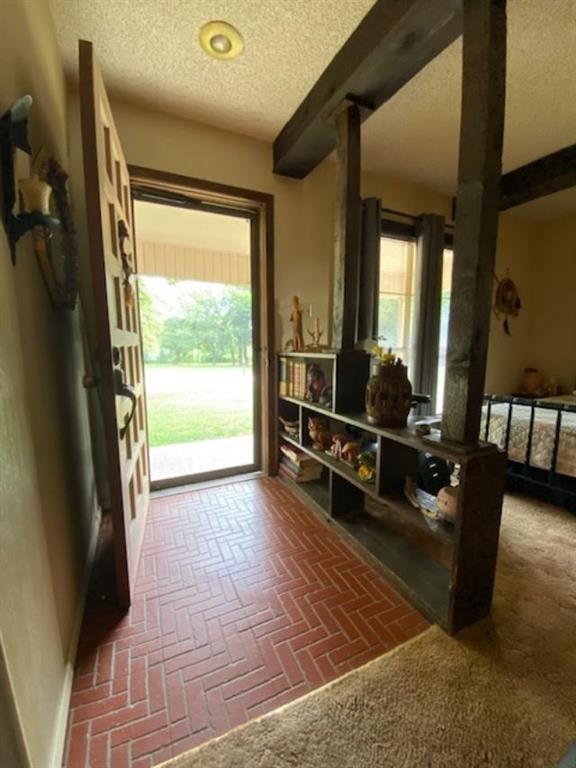 233 Elm Branch Whitney, TX 76692 - Photo 29 of 30 a room with wooden floor and furniture