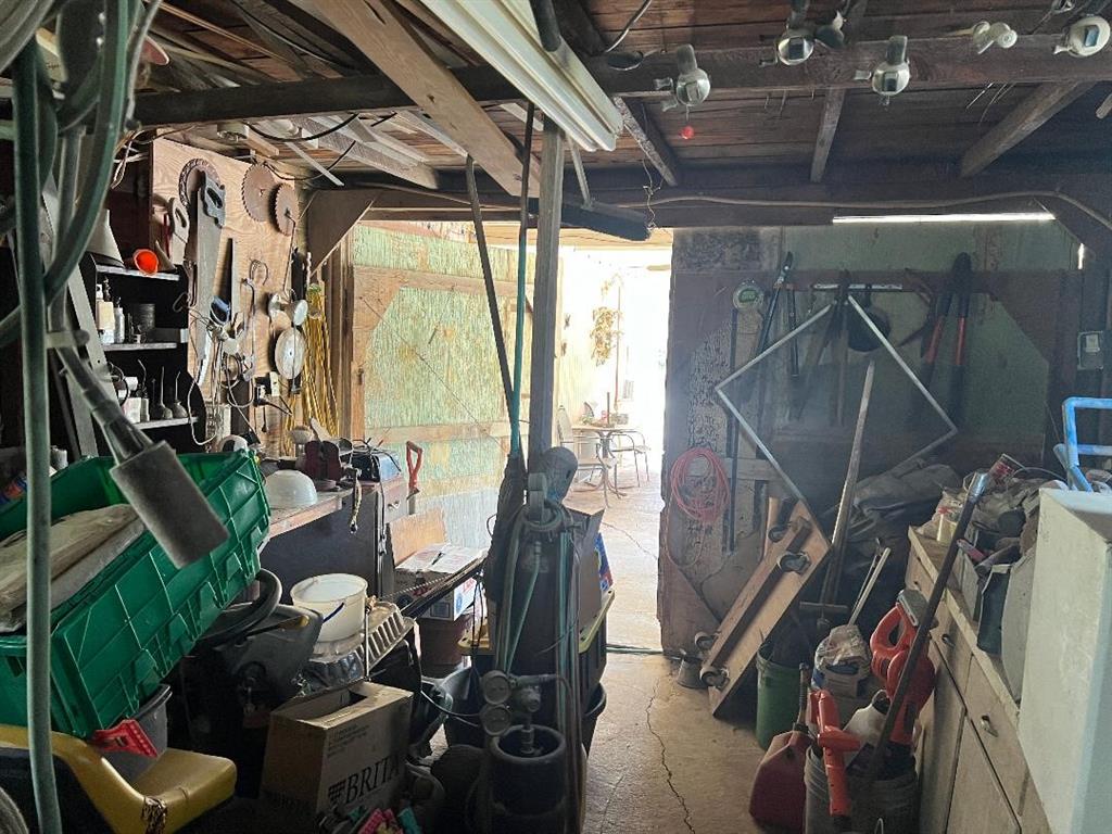 233 Elm Branch Whitney, TX 76692 - Photo 6 of 30 a view of walk in closet with clothes and shoes