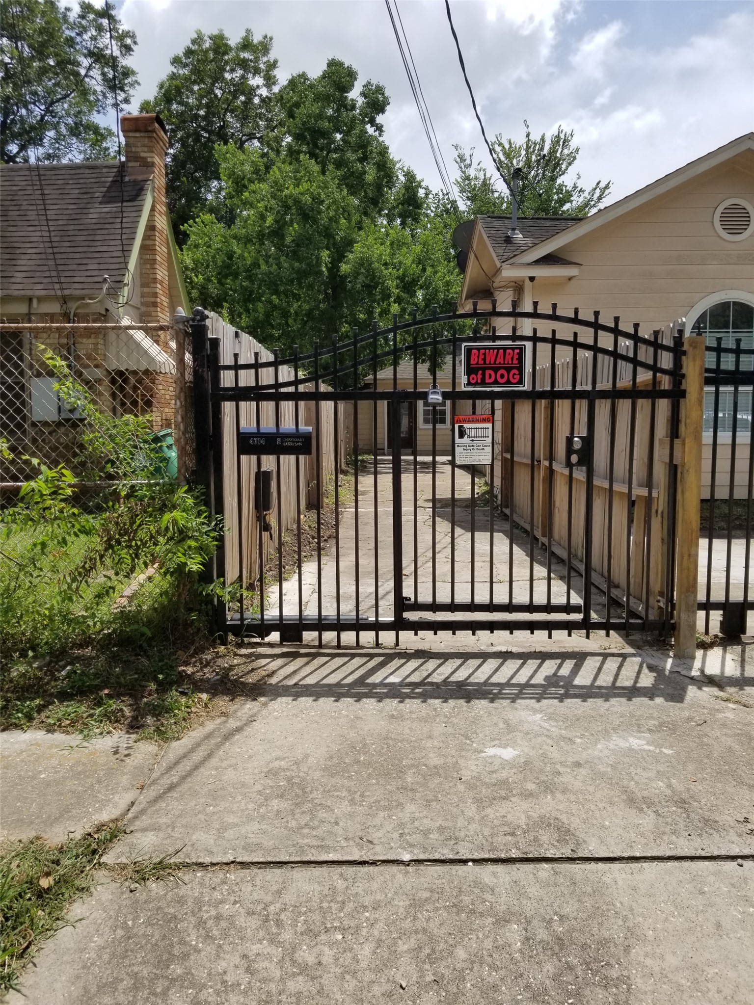 4714 Sharon Street Houston, TX 77020 - Photo 1 of 11 a view of a black gate
