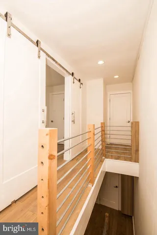 a view of a bathroom with a tub and shower