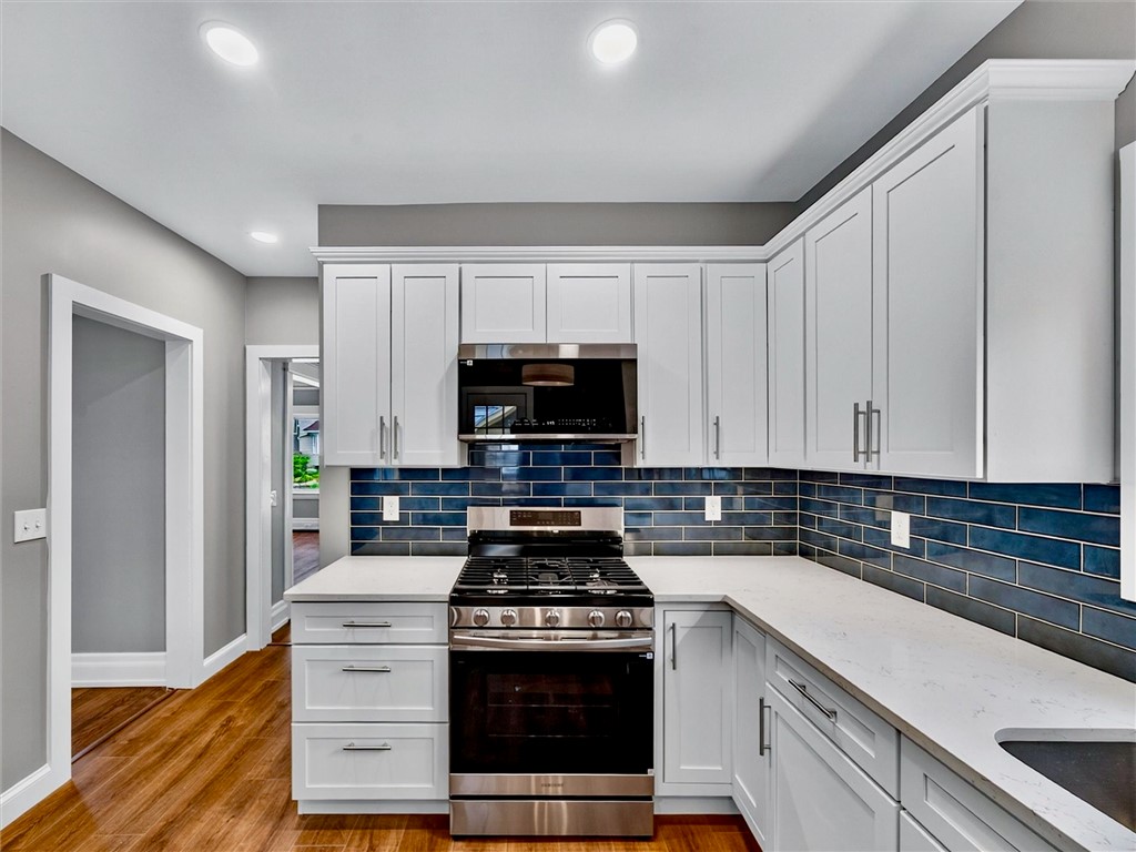 132 Mulberry Street Rochester, NY 14620 - Photo 3 of 50 Brand new kitchen with quartz counters. All new appliances