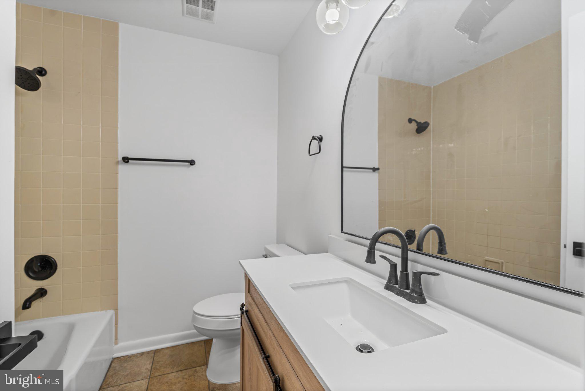 1317 Roxboro Road Baltimore, MD 21237 - Photo 25 of 30 Modern bathroom with sleek finishes.