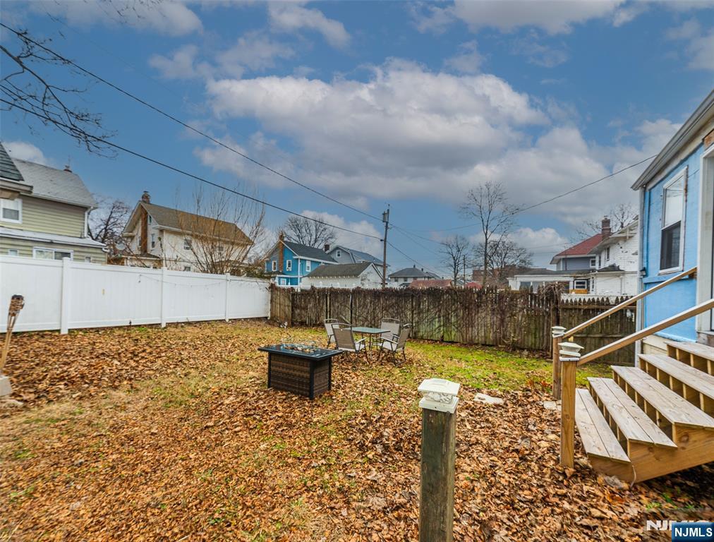 61-63 Keer Avenue Newark, NJ 07112 - Photo 28 of 33 a view of a swimming pool with a patio