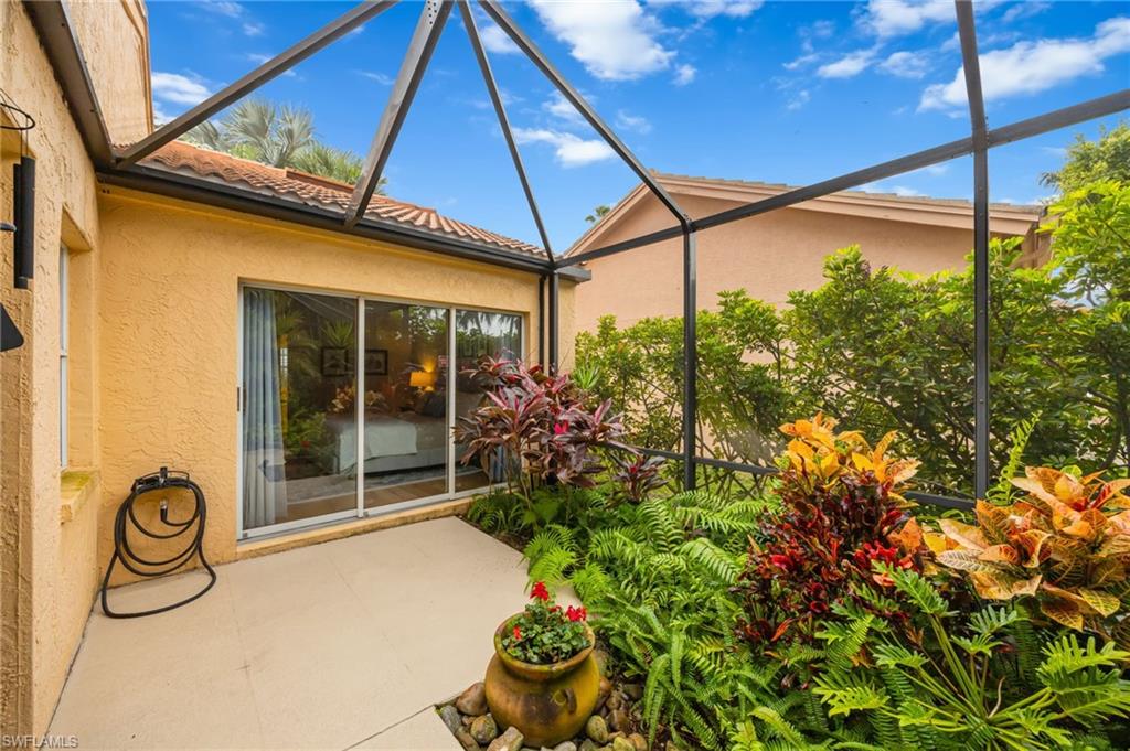 7546 Mill Pond Circle Naples, FL 34109 - Photo 21 of 32 a view of a backyard with plants