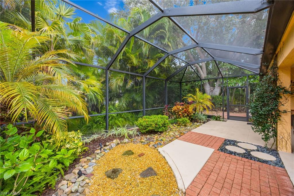 7546 Mill Pond Circle Naples, FL 34109 - Photo 23 of 32 a view of a backyard