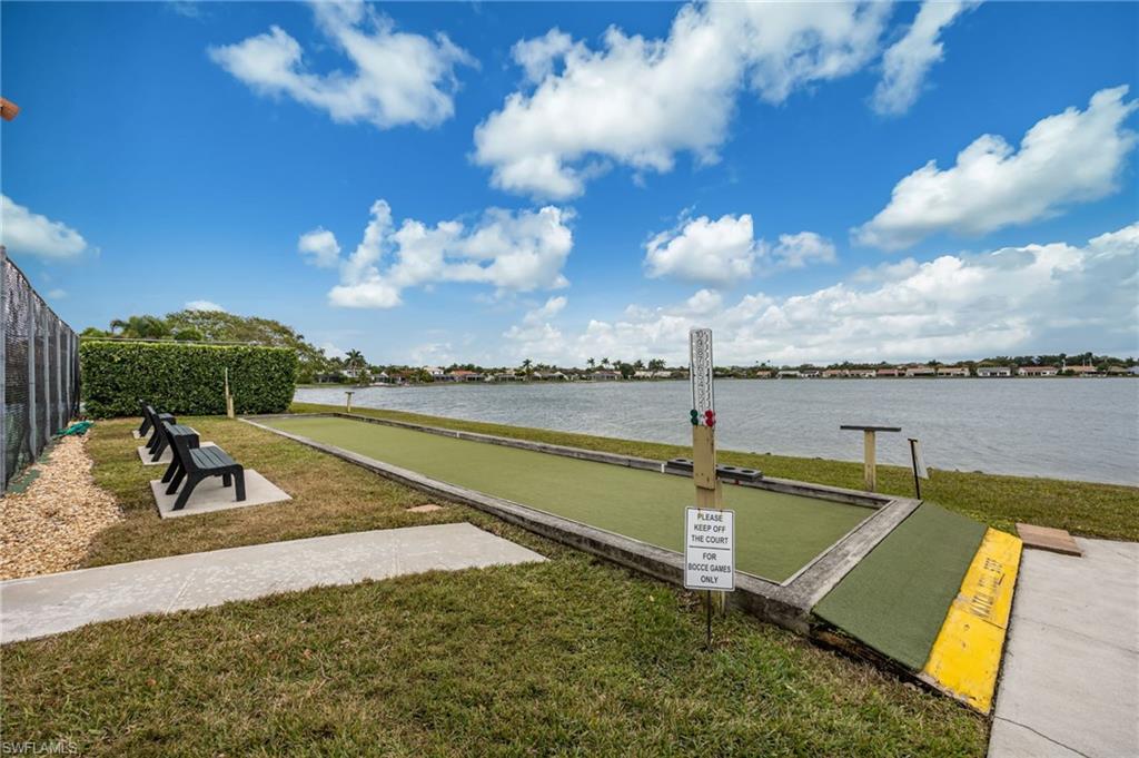 7546 Mill Pond Circle Naples, FL 34109 - Photo 28 of 32 a view of a swimming pool with a patio