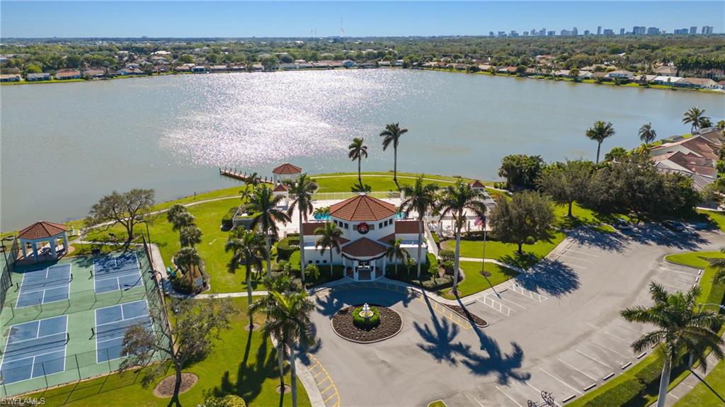 7546 Mill Pond Circle Naples, FL 34109 - Photo 32 of 32 an aerial view of a house with a lake view