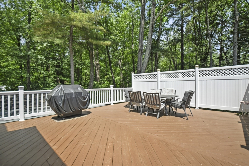 23 Cove Road Lunenburg, MA 01462 - Photo 31 of 42 a view of patio with a table and chairs