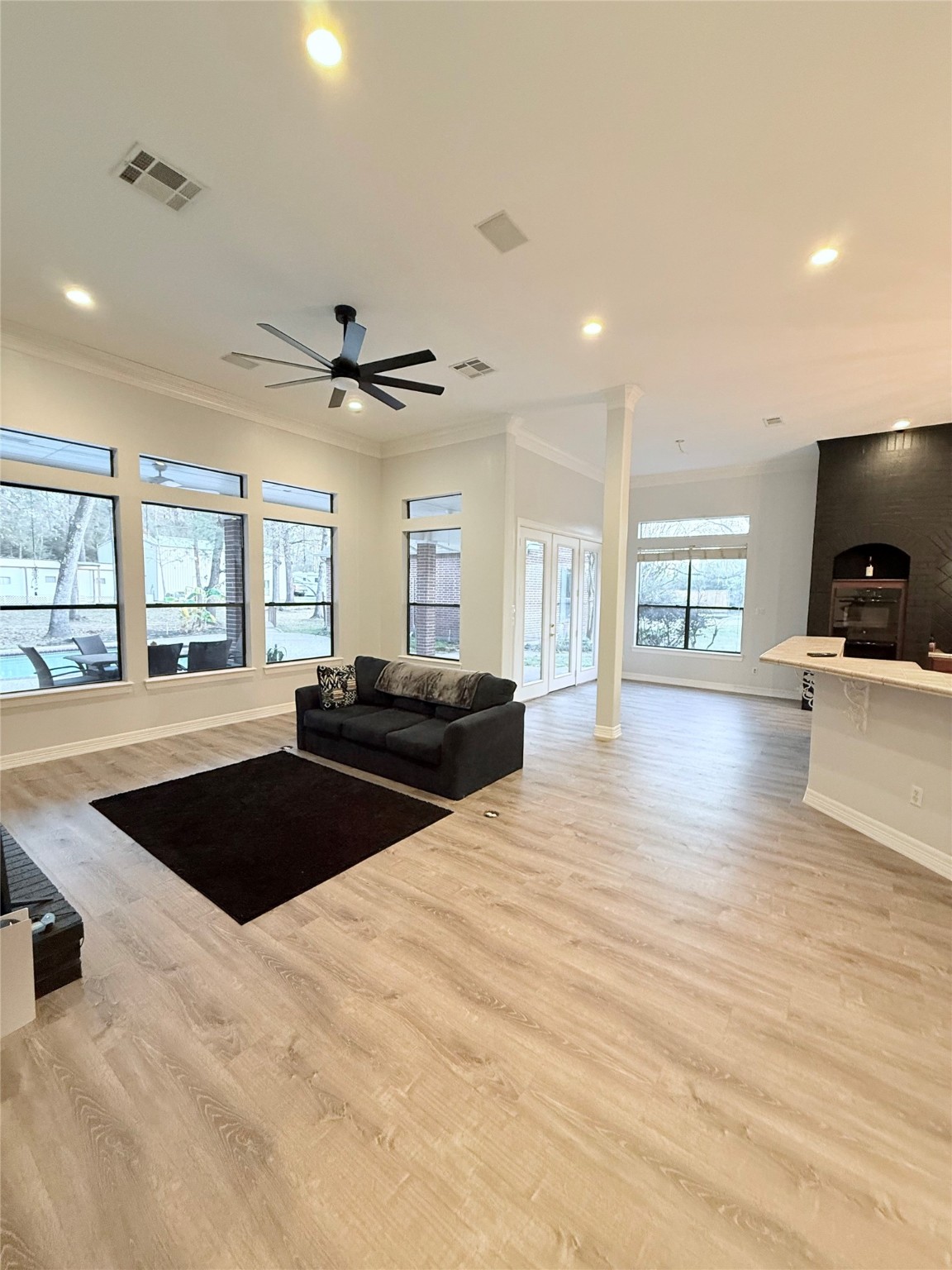 15567 Old Conroe Road Conroe, TX 77384 - Photo 19 of 31 a kitchen with stainless steel appliances granite countertop a sink a stove and a wooden floors