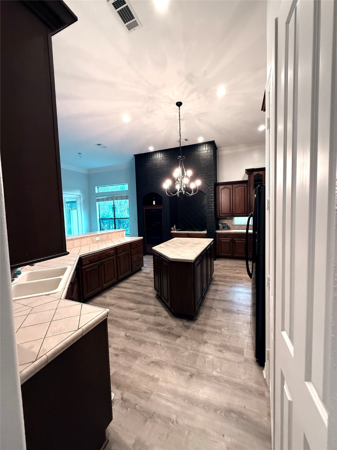 15567 Old Conroe Road Conroe, TX 77384 - Photo 24 of 31 a living room with furniture and a flat screen tv