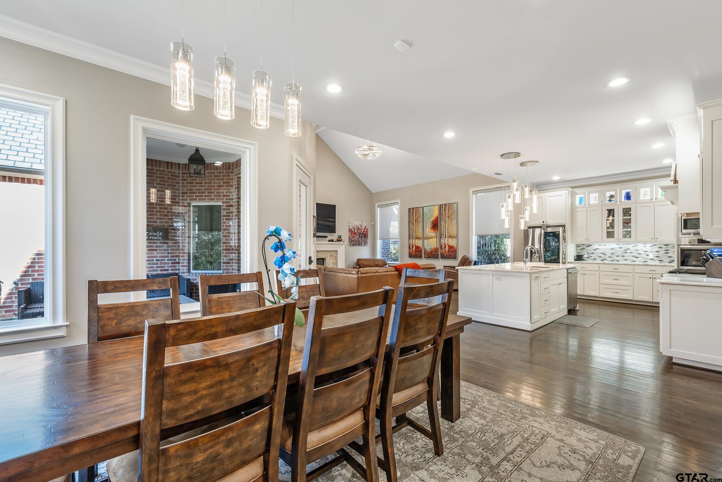 4535 Triggs Trace Tyler, TX 75709 - Photo 12 of 46 a view of a dining area with furniture window and wooden floor