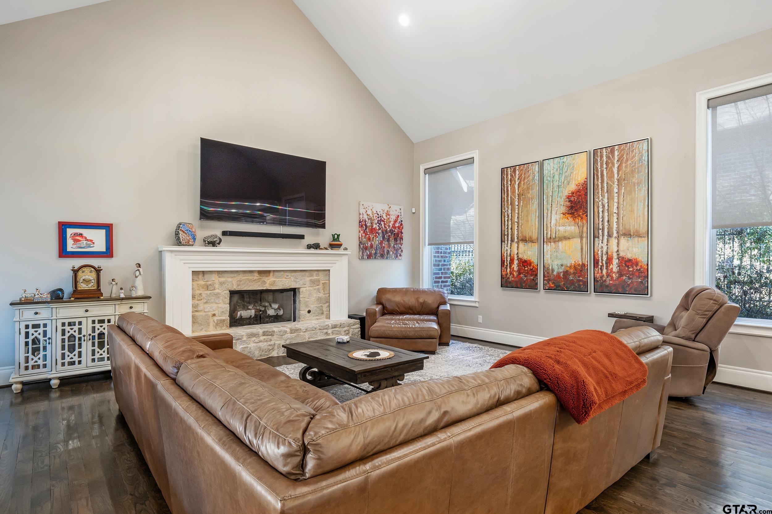 4535 Triggs Trace Tyler, TX 75709 - Photo 15 of 46 a living room with furniture fireplace and flat screen tv