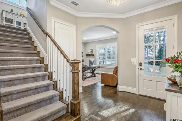 a kitchen with granite countertop a stove and a sink