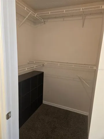 a living room with a couch and a table