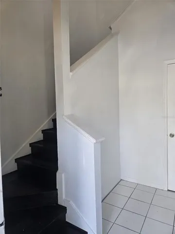 a view of entryway with stairs