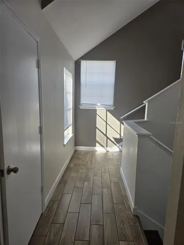 a view of entryway with wooden floor