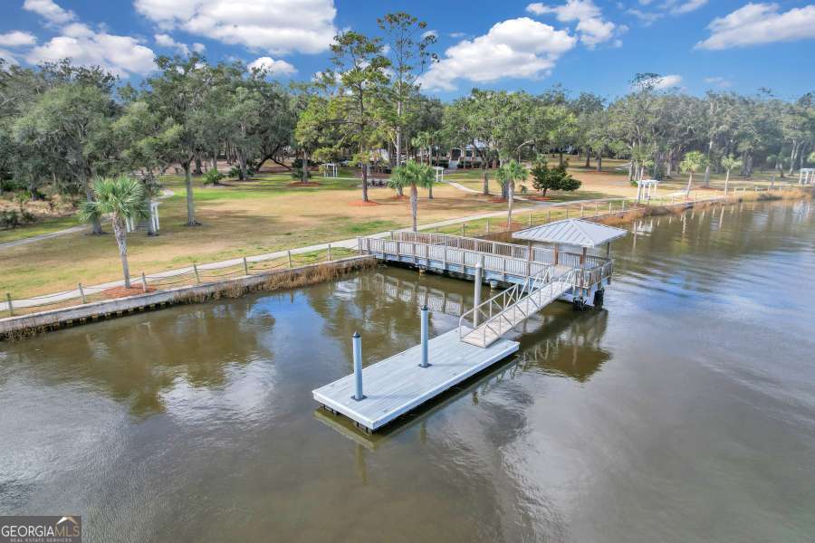 Lot 11 Navigator Way Waverly, GA 31565 - Photo 26 of 31 a view of a swimming pool with a patio