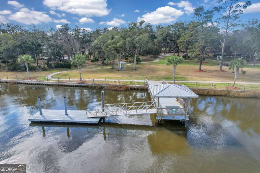 Lot 11 Navigator Way Waverly, GA 31565 - Photo 27 of 31 a view of a lake with sitting area