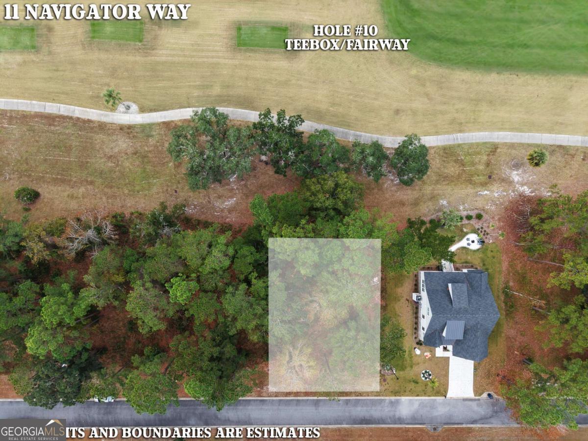 Lot 11 Navigator Way Waverly, GA 31565 - Photo 3 of 31 an aerial view of a house with a yard and lake view