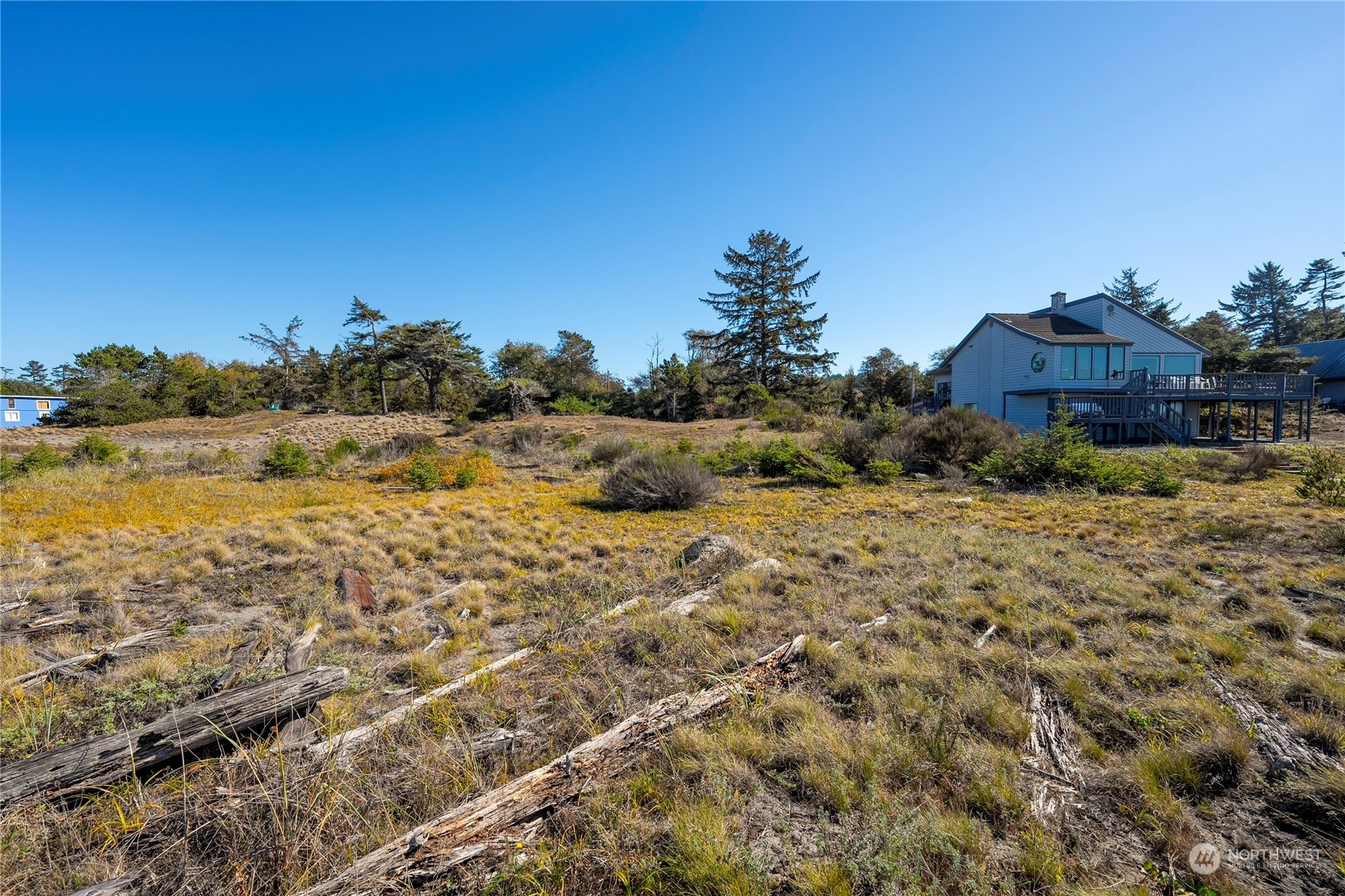 -lot B Rolling Dunes Lane Oak Harbor, WA 98277 - Photo 13 of 19 a view of a town with mountains in the background