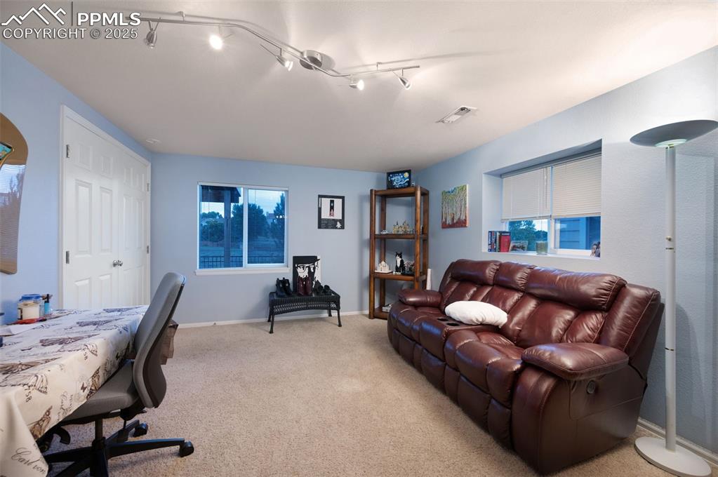 6370 Perfect View Colorado Springs, CO 80919 - Photo 28 of 49 a living room with furniture