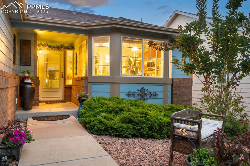 6370 Perfect View Colorado Springs, CO 80919 - Photo 3 of 49 a garden view with a seating space