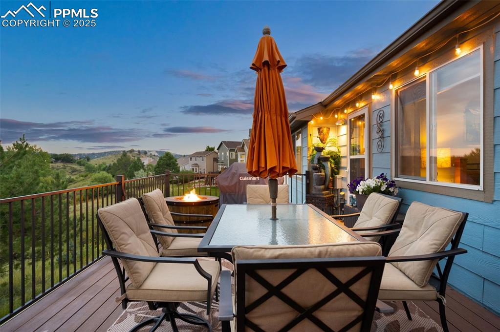 6370 Perfect View Colorado Springs, CO 80919 - Photo 41 of 49 a view of an outdoor dining space with furniture