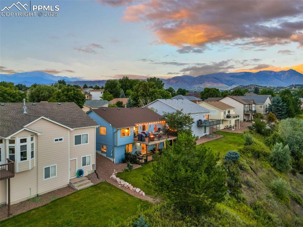 6370 Perfect View Colorado Springs, CO 80919 - Photo 45 of 49 a view of house with garden space and street view