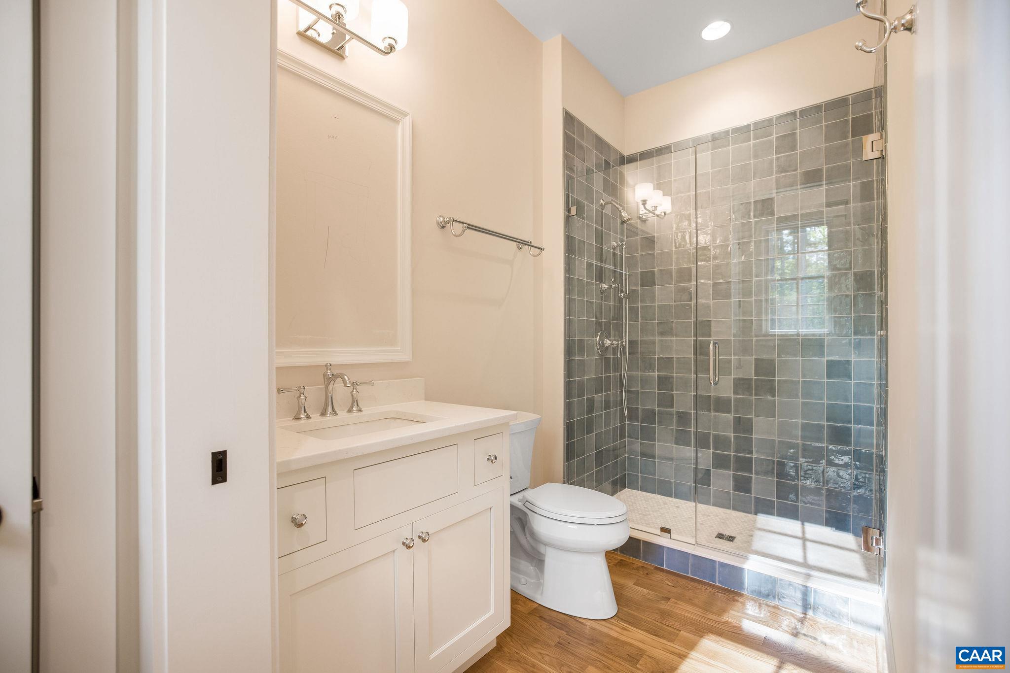 3.12 Acres Tbb Garth Road Charlottesville, VA 22901 - Photo 11 of 52 a bathroom with a toilet sink and shower