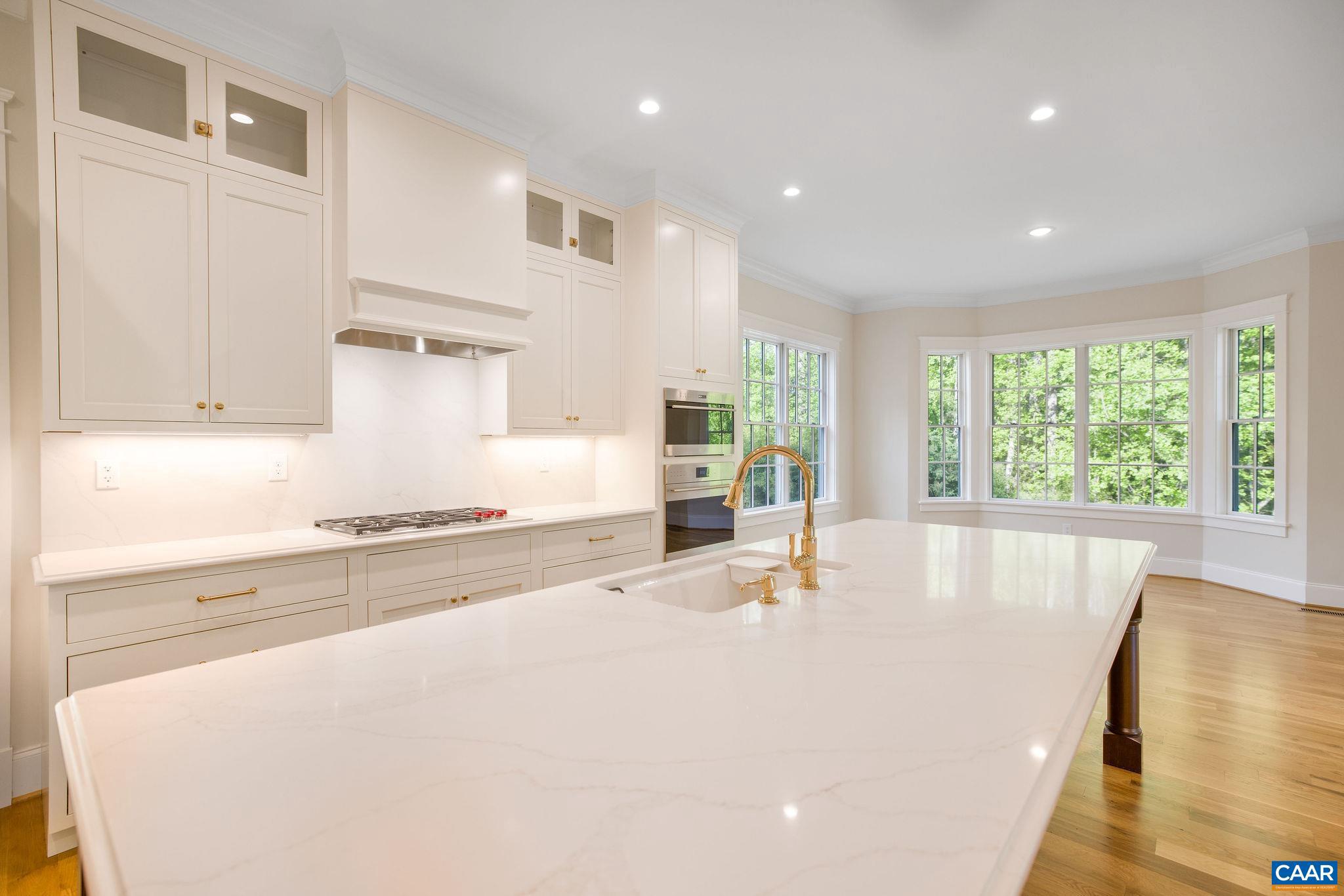 3.12 Acres Tbb Garth Road Charlottesville, VA 22901 - Photo 13 of 52 a large white kitchen with wooden floor and large window