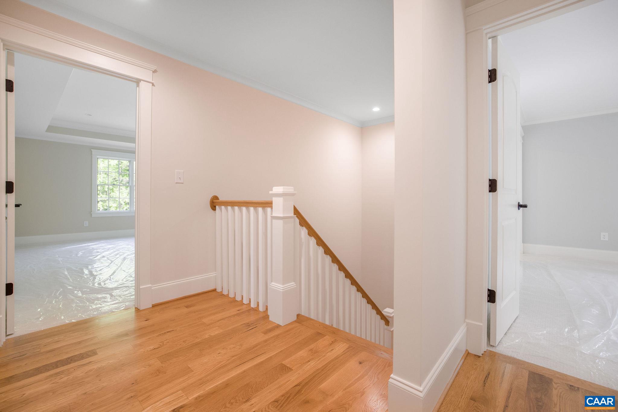 3.12 Acres Tbb Garth Road Charlottesville, VA 22901 - Photo 28 of 52 a view of a hallway view with wooden floor and staircase
