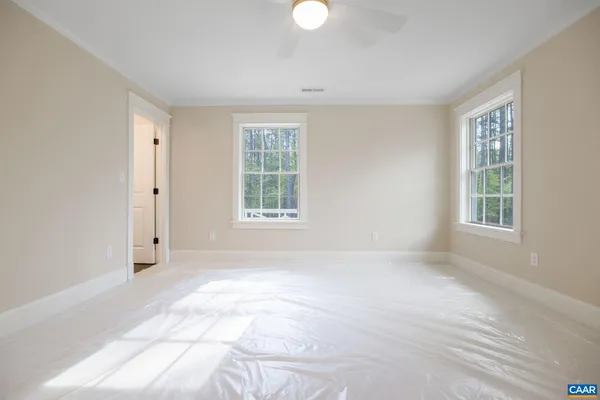 a room with a window and a sink