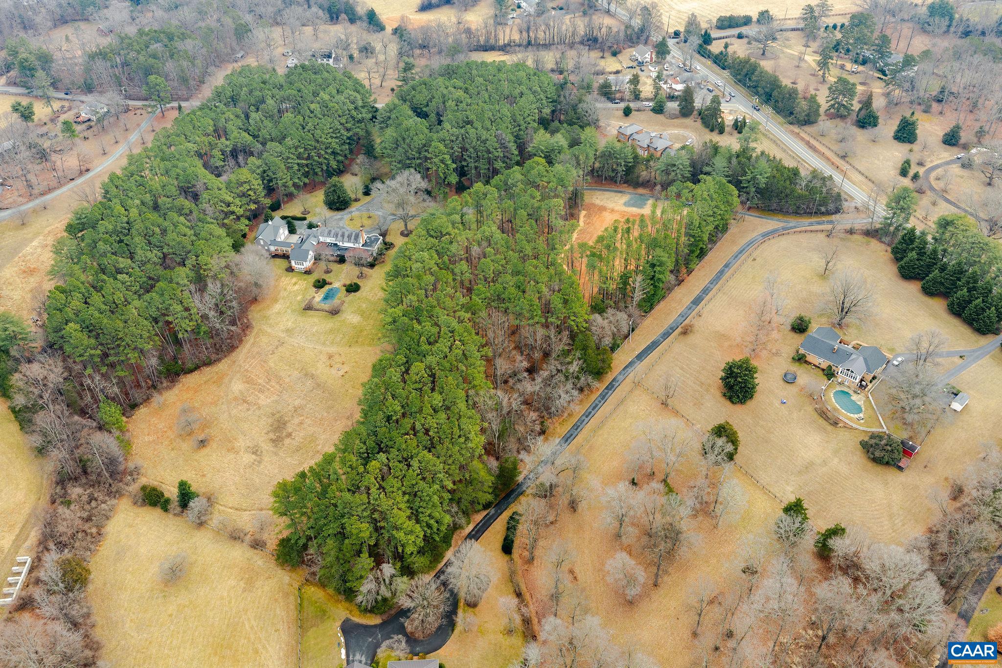 3.12 Acres Tbb Garth Road Charlottesville, VA 22901 - Photo 52 of 52 an aerial view of a house with a yard and lake view in back