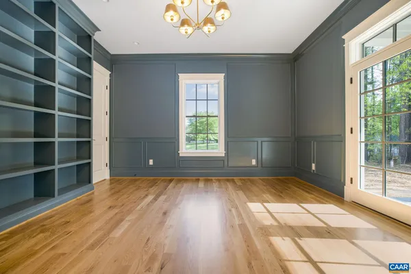 a view of a livingroom with wooden floor