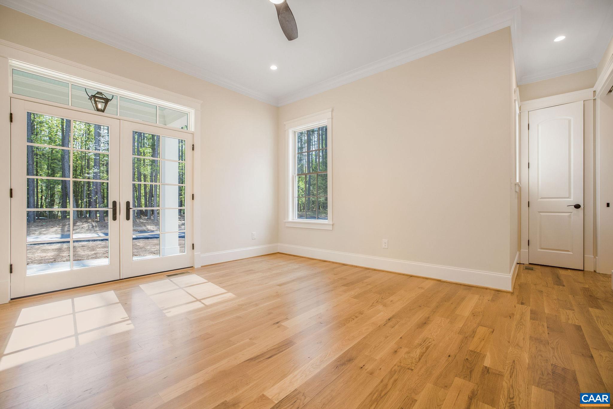 3.12 Acres Tbb Garth Road Charlottesville, VA 22901 - Photo 10 of 52 a view of an empty room with wooden floor and a window