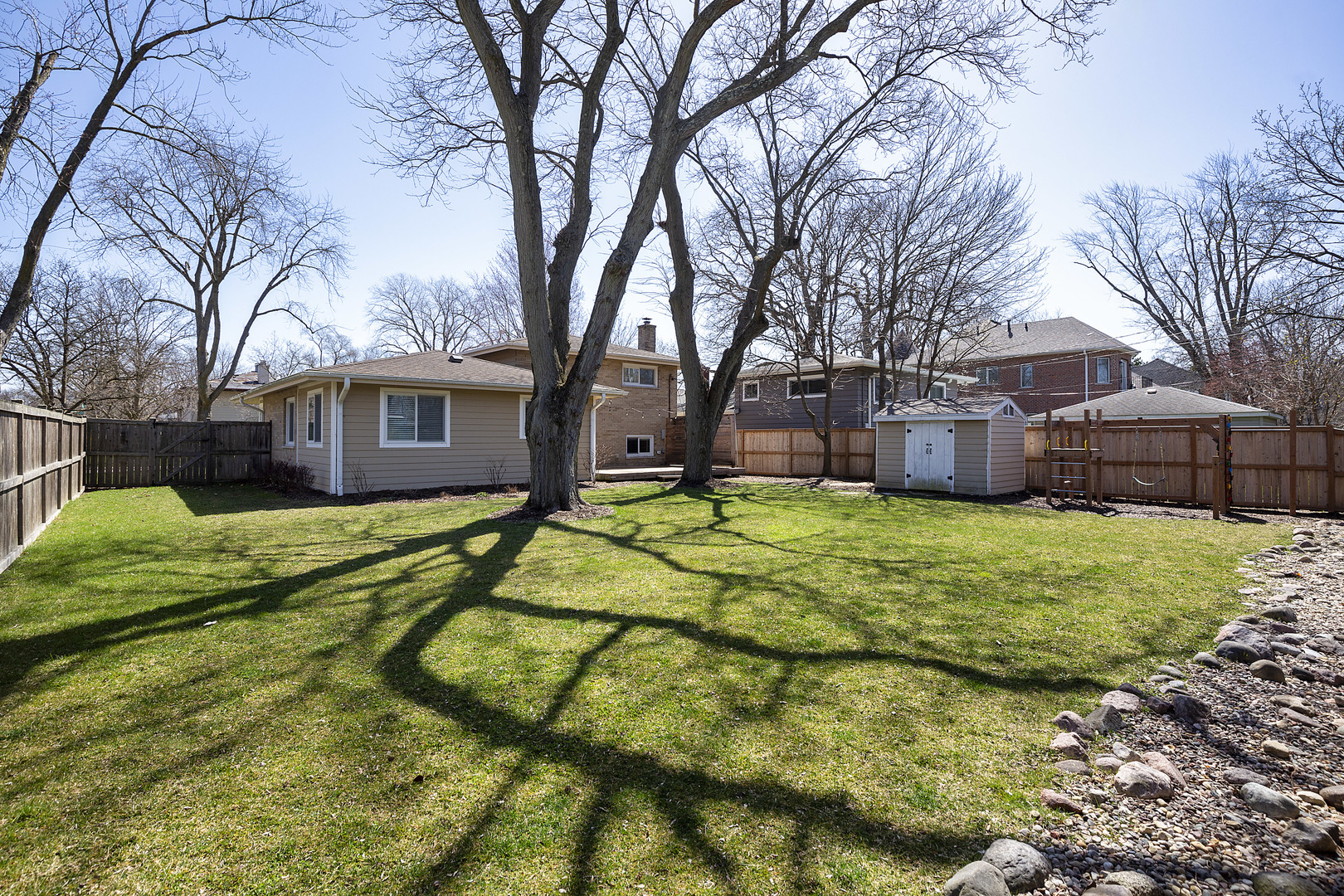 1342 Kenton Road Deerfield, IL 60015 - Photo 12 of 12 a view of a house with a yard